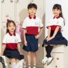 Mẫu Đồng Phục Mầm Non Màu Đỏ Phối Nửa Thân - 1